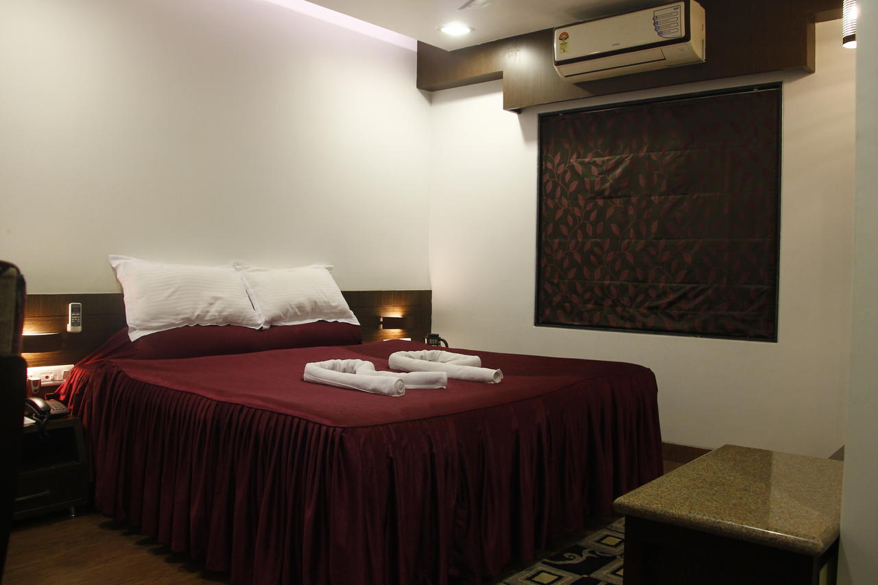 Hotel Rajashree Palace Sziliguri Szoba fotó